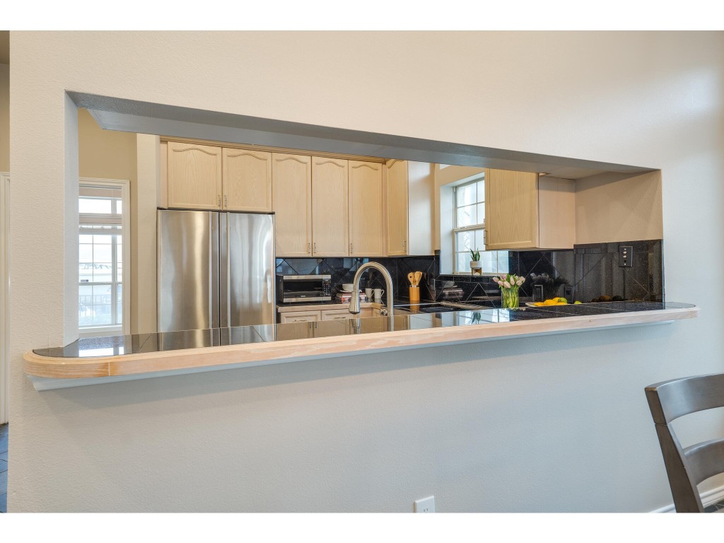 2918 Ranch Road 620 North, Unit U254 Austin, TX 78734 - Photo 10 of 35 a view of kitchen with furniture and large window