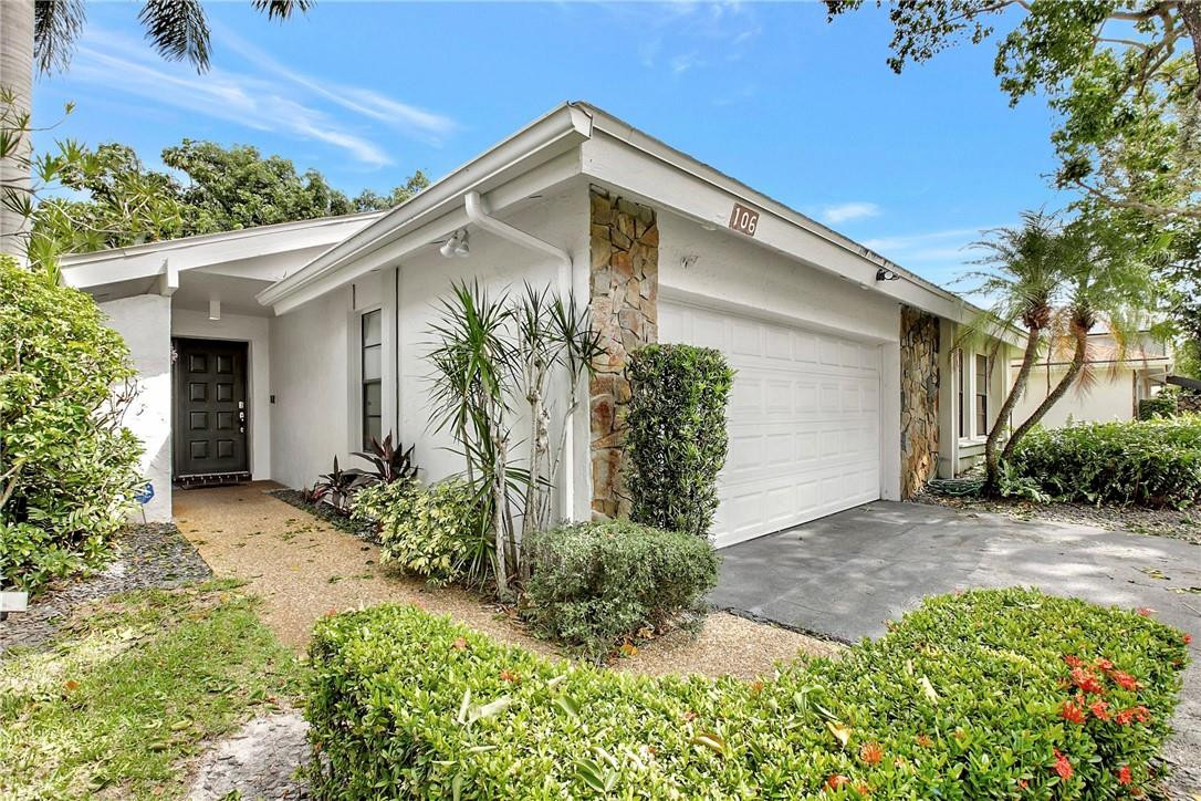 106 Kensington Road Hollywood, FL 33021 - Photo 5 of 42 a front view of house with yard