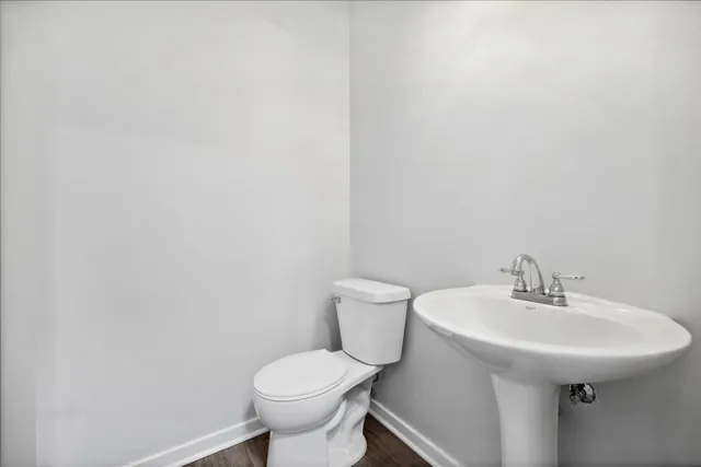 a bathroom with a sink and a toilet