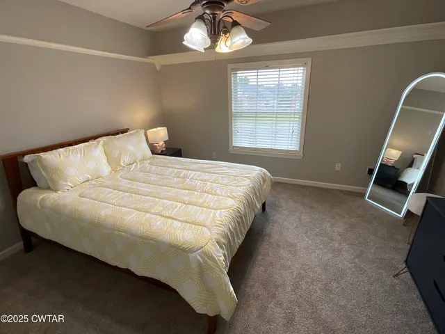 an empty room with a empty space and windows