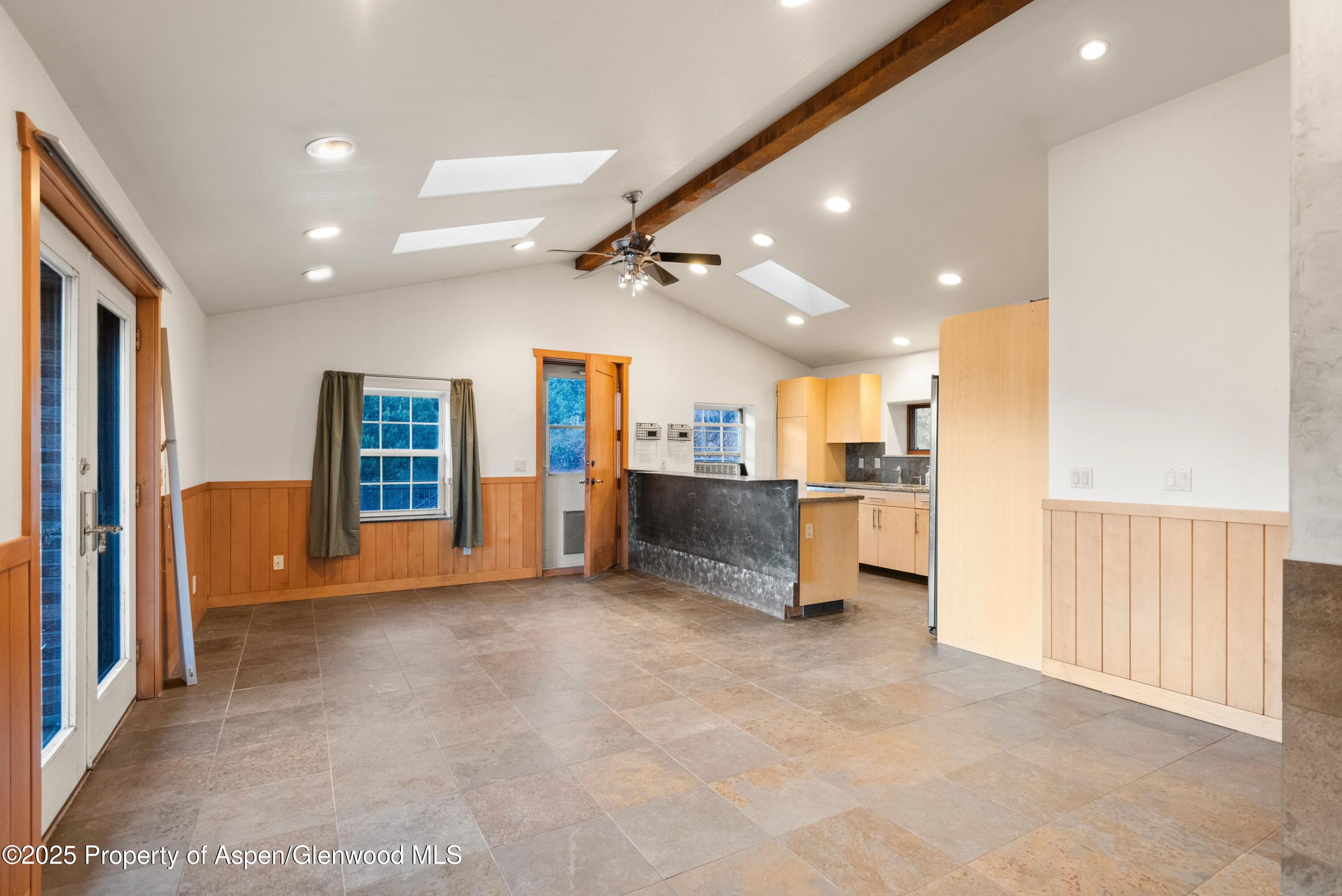 2800 Cedar Drive Basalt, CO 81621 - Photo 9 of 28 a view of a kitchen with a refrigerator and a sink