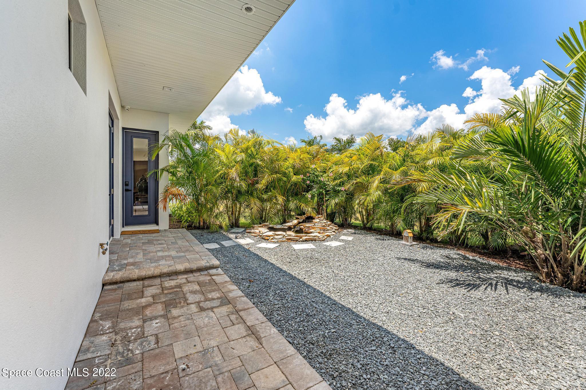 4574 Milost Drive Rockledge, FL 32955 - Photo 22 of 41 a view of a pathway of a house