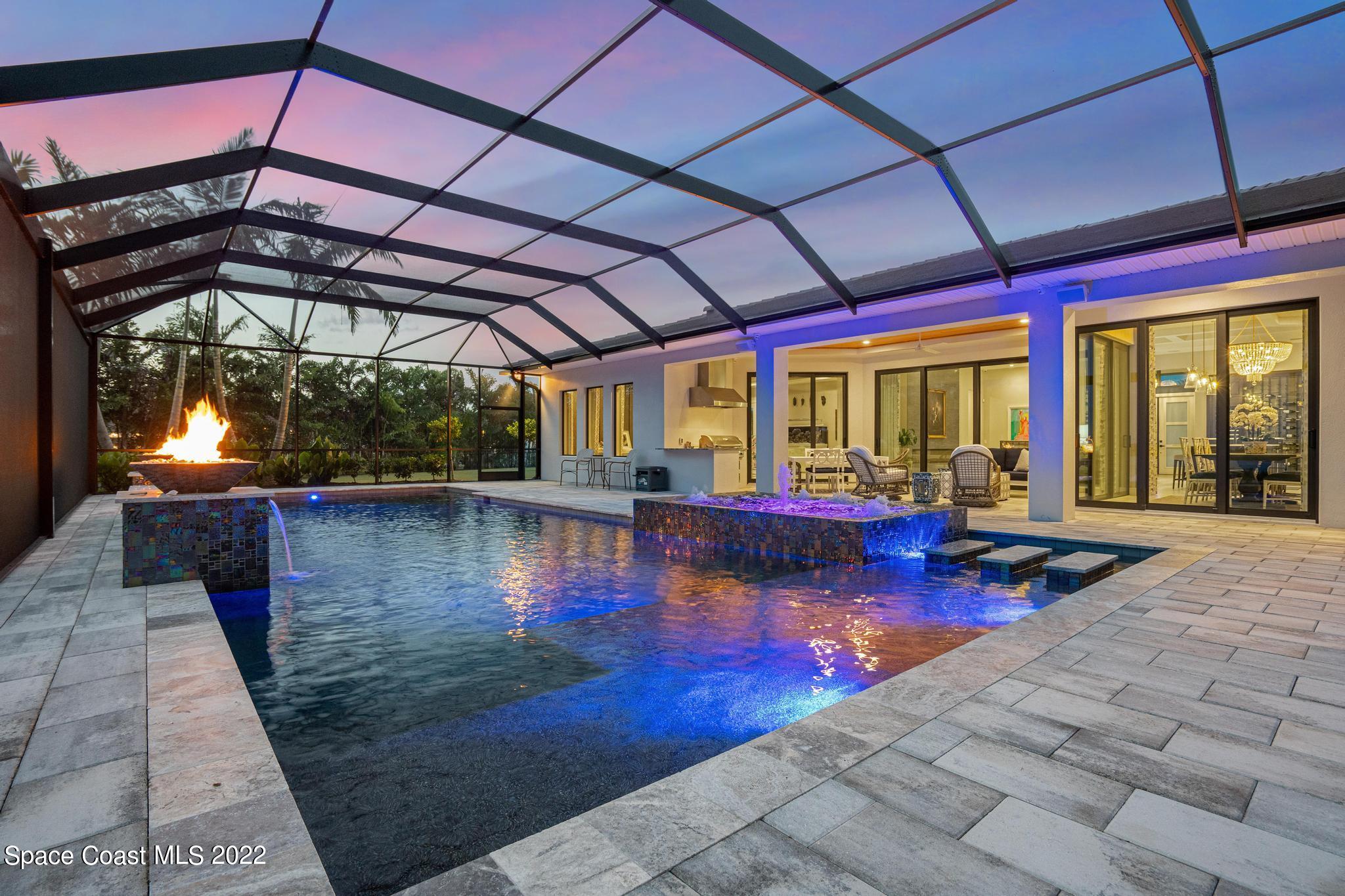 4574 Milost Drive Rockledge, FL 32955 - Photo 32 of 41 a view of swimming pool with sitting area