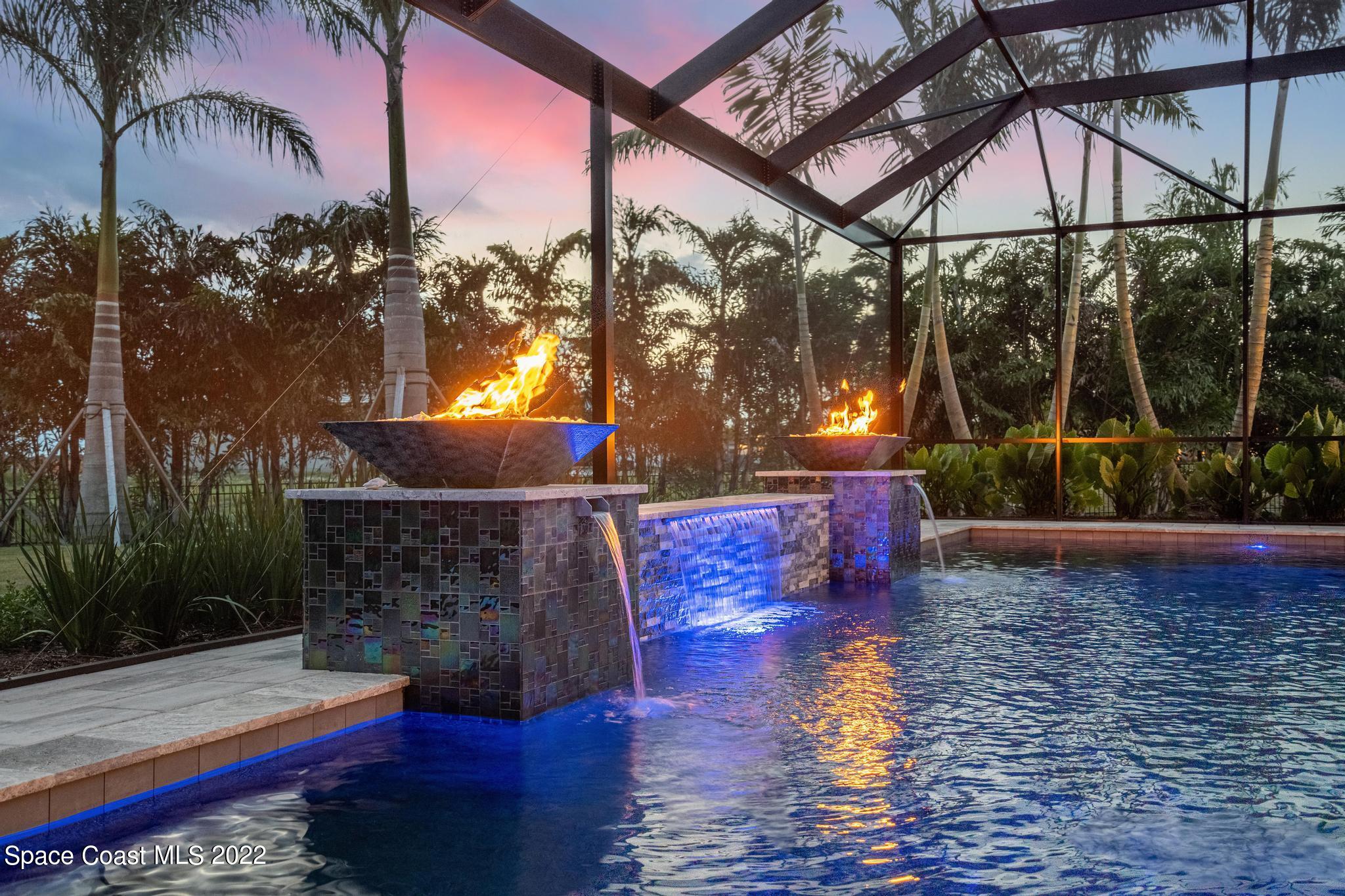 4574 Milost Drive Rockledge, FL 32955 - Photo 34 of 41 a view of a yard with a patio