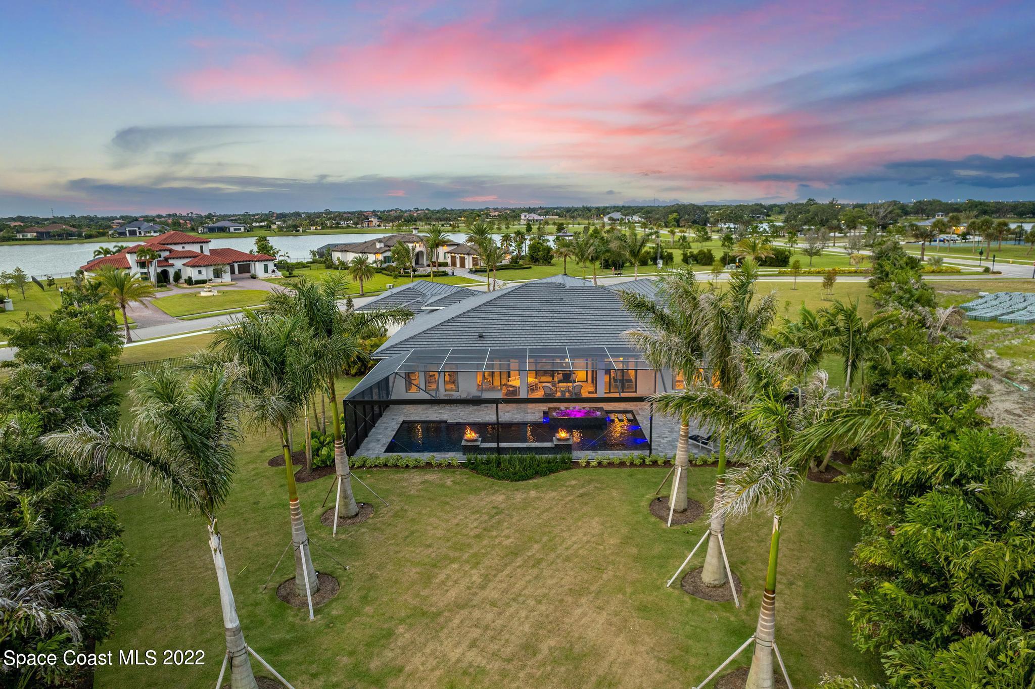 4574 Milost Drive Rockledge, FL 32955 - Photo 35 of 41 a aerial view of a house with a big yard