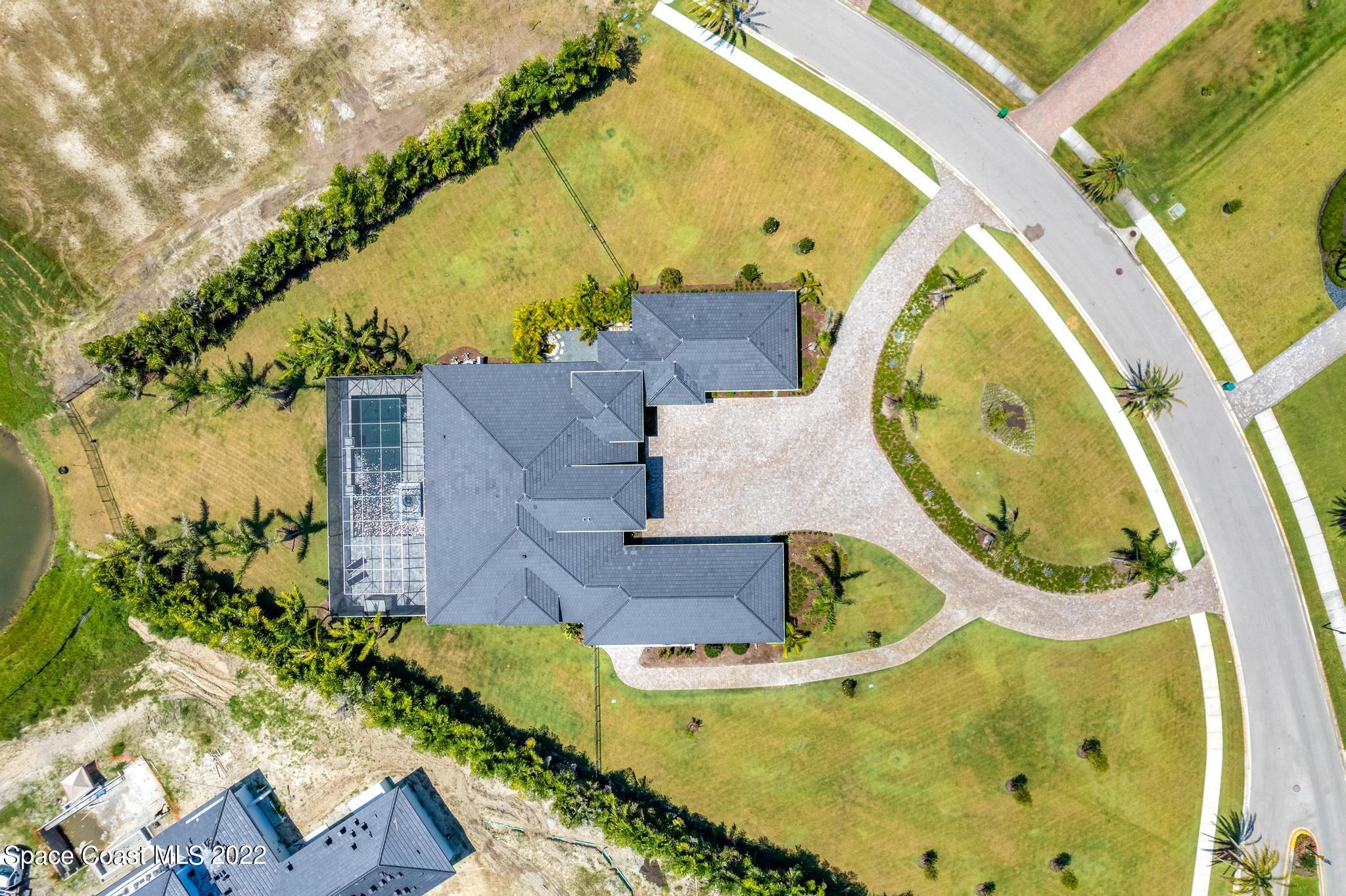 4574 Milost Drive Rockledge, FL 32955 - Photo 38 of 41 an aerial view of a swimming pool