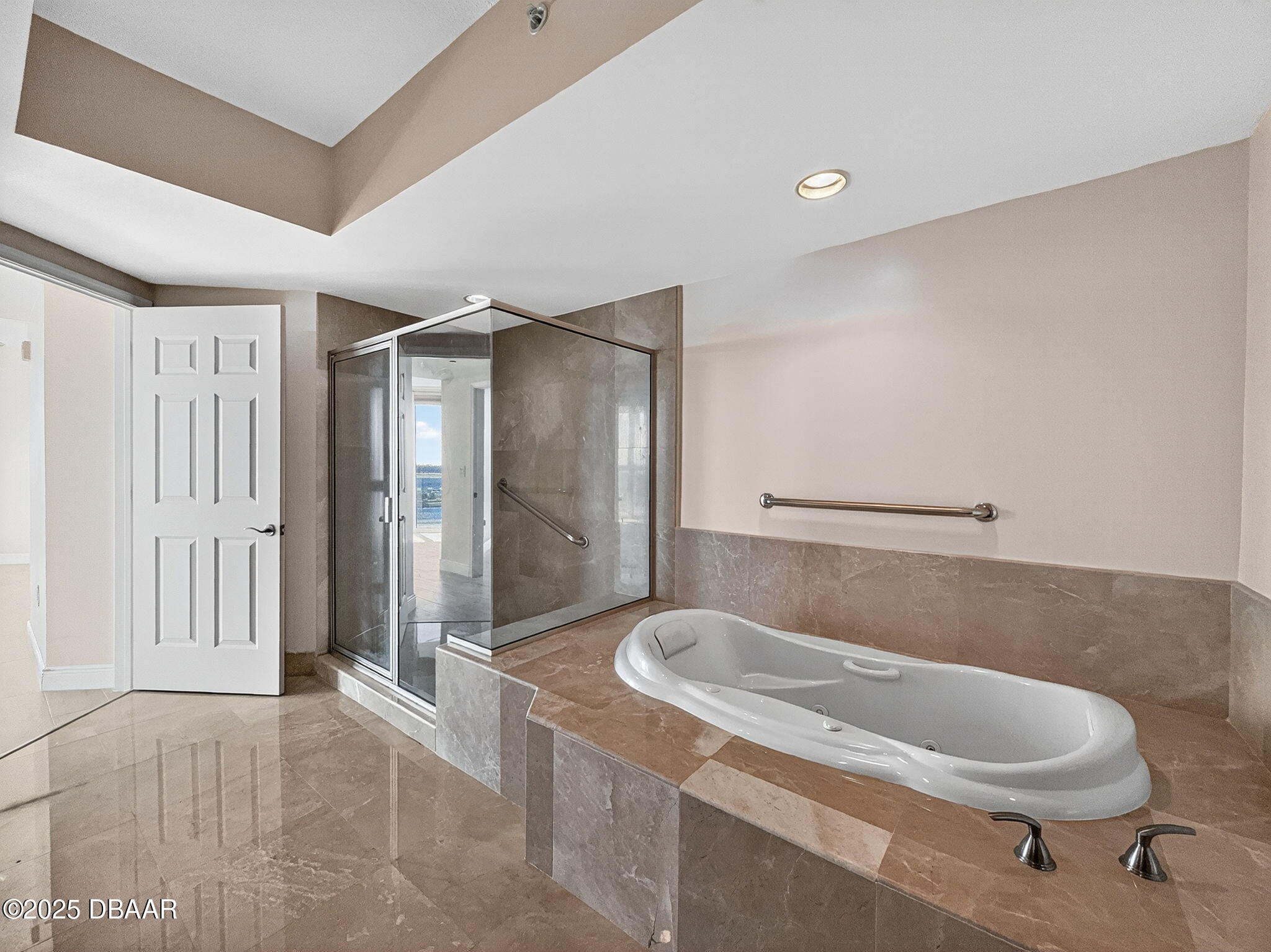 231 Riverside Drive, Unit 903 Holly Hill, FL 32117 - Photo 12 of 28 a bathroom with a granite countertop sink and toilet