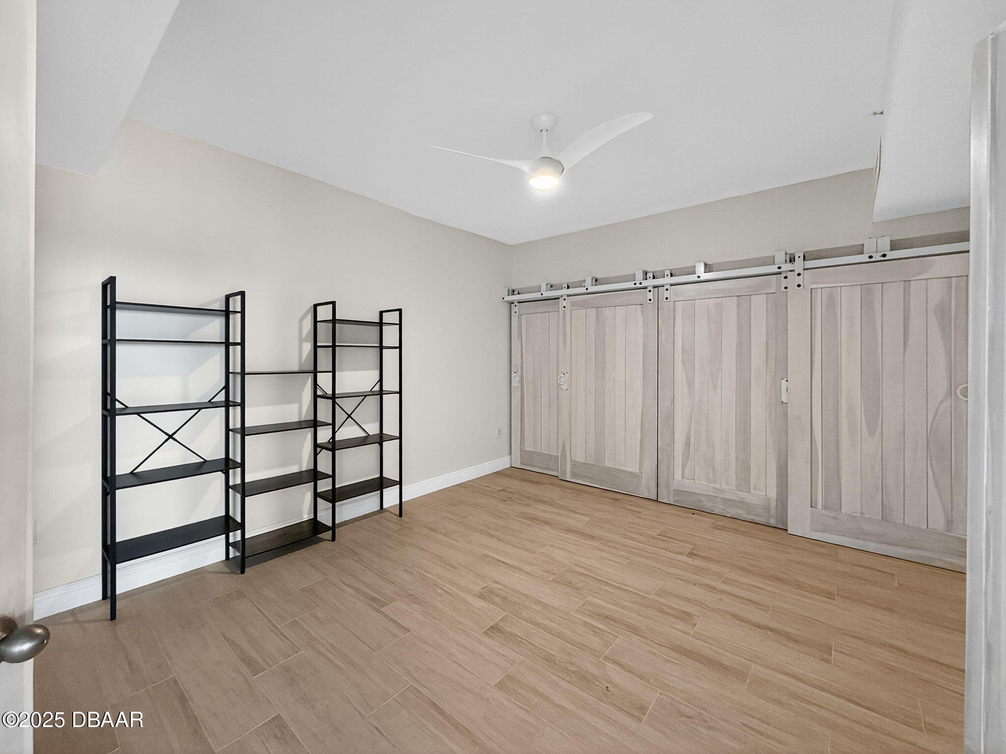 231 Riverside Drive, Unit 903 Holly Hill, FL 32117 - Photo 20 of 28 a view of a room with racks on the wall