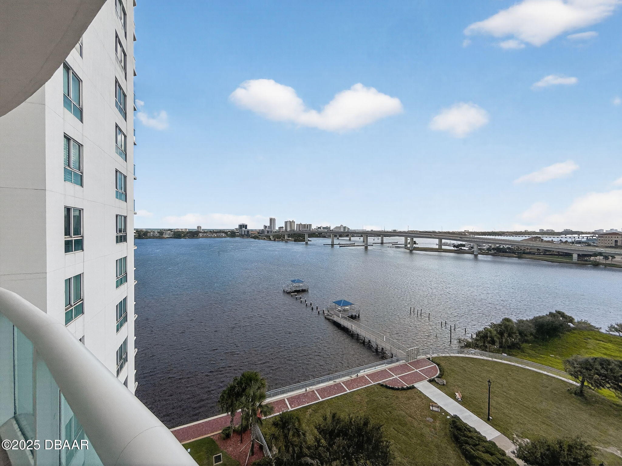 231 Riverside Drive, Unit 903 Holly Hill, FL 32117 - Photo 28 of 28 a view of a lake from a balcony