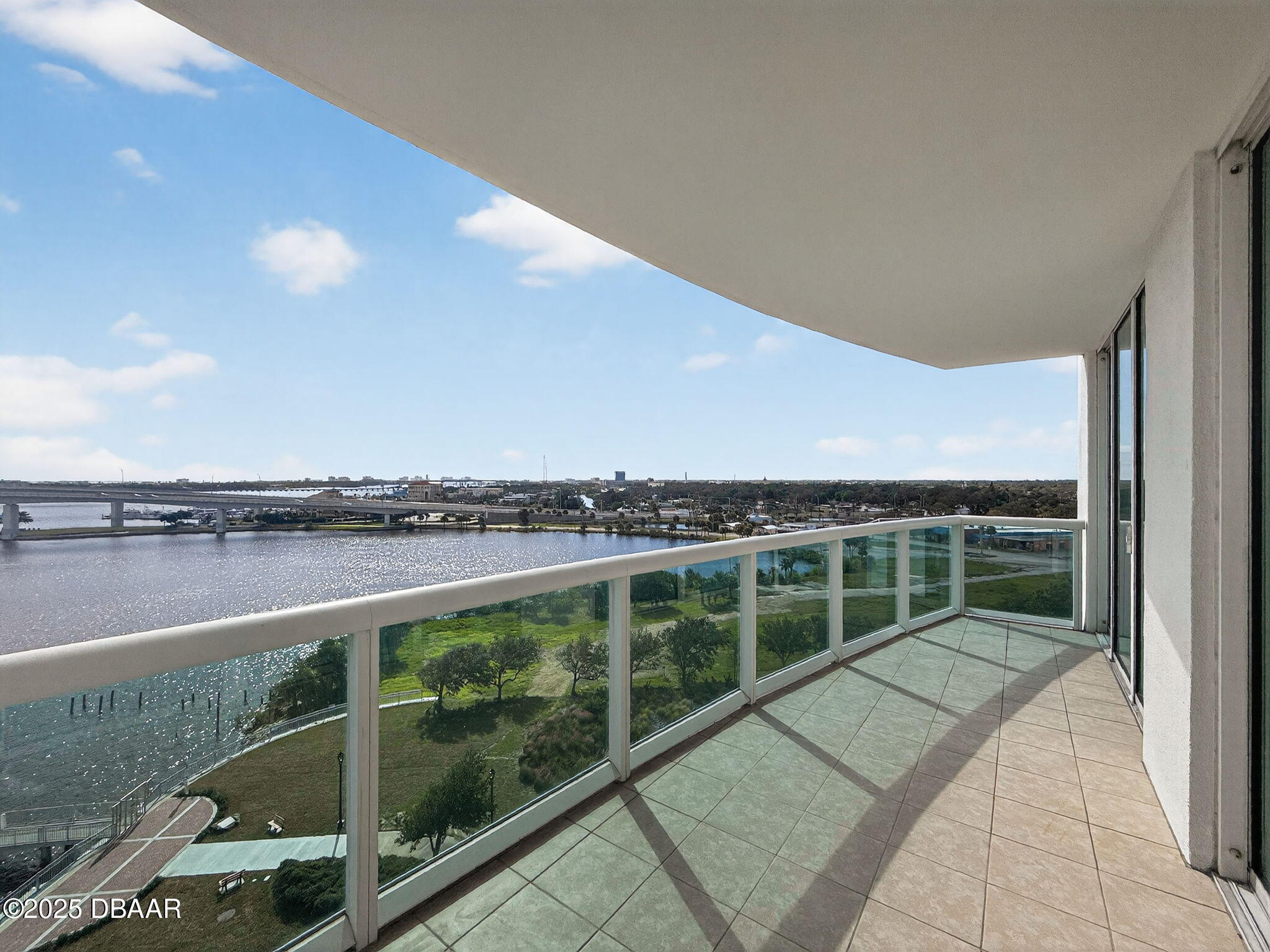 231 Riverside Drive, Unit 903 Holly Hill, FL 32117 - Photo 10 of 28 a view of a balcony with lake view