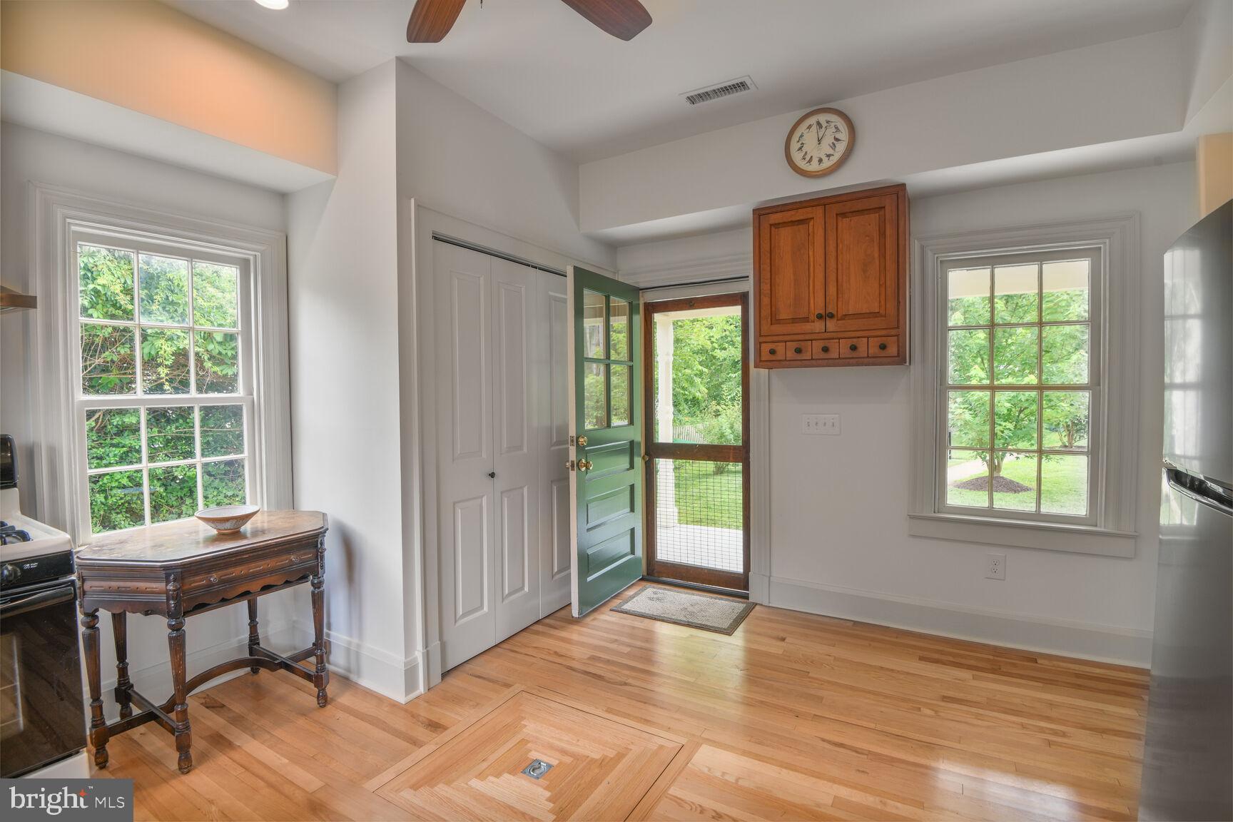7651 Main Street Tilghman, MD 21671 - Photo 23 of 35 a view of a bedroom with a window and wooden floor