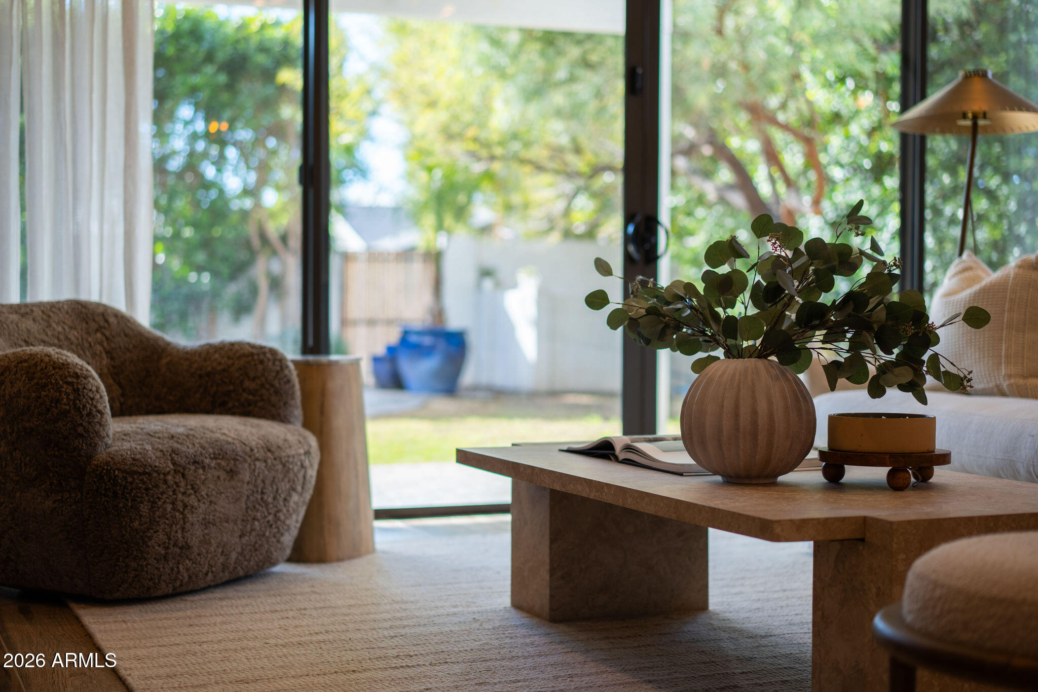 4533 East Montecito Avenue Phoenix, AZ 85018 - Photo 12 of 29 a living room with furniture and a potted plant