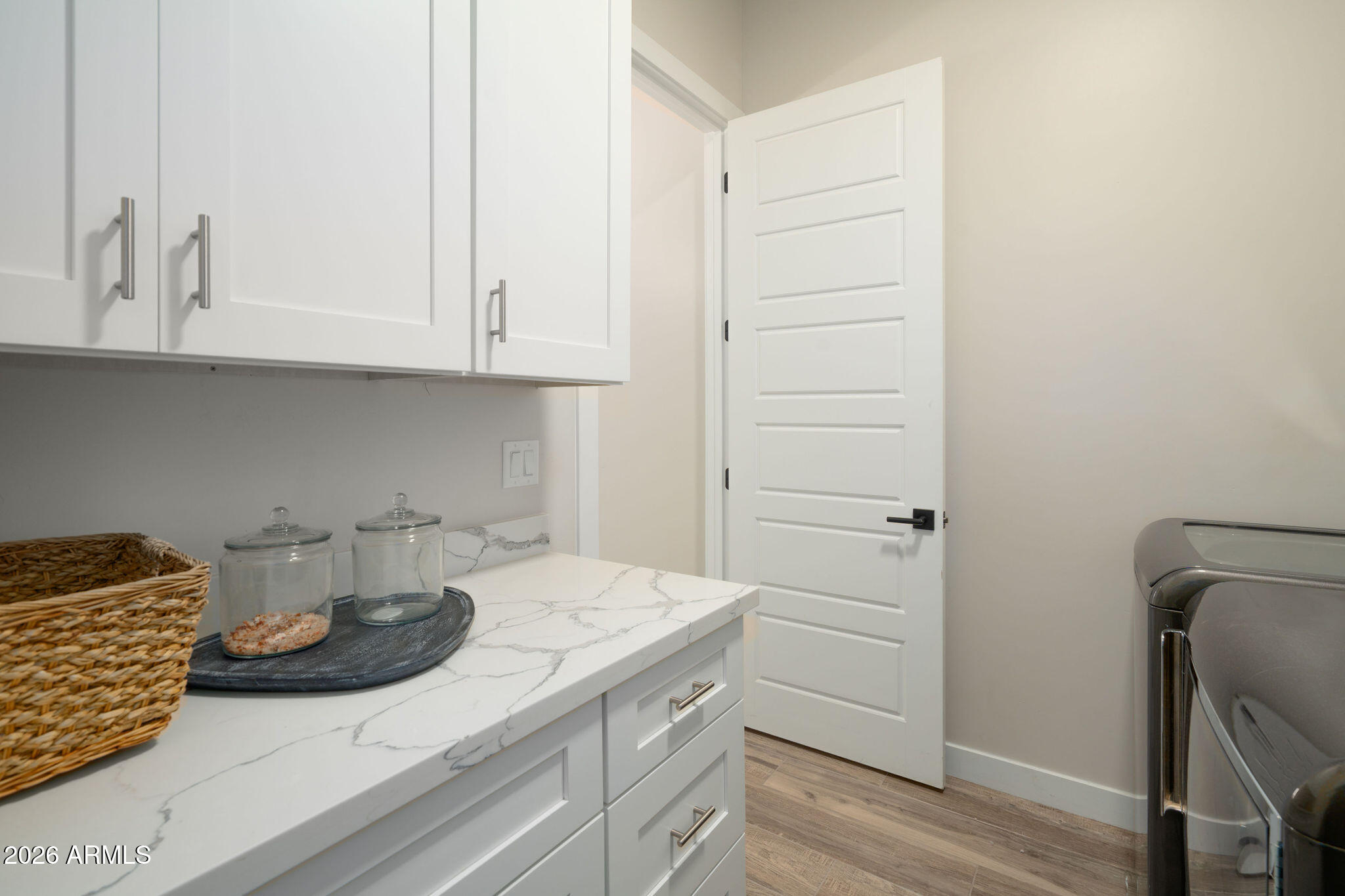 4533 East Montecito Avenue Phoenix, AZ 85018 - Photo 21 of 29 a kitchen with a sink and cabinets