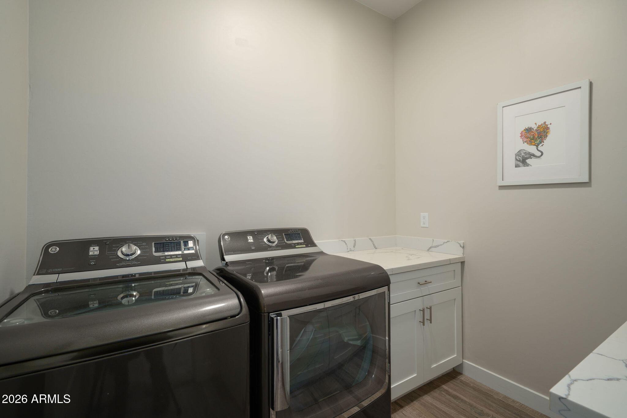 4533 East Montecito Avenue Phoenix, AZ 85018 - Photo 22 of 29 a utility room with dryer and washer