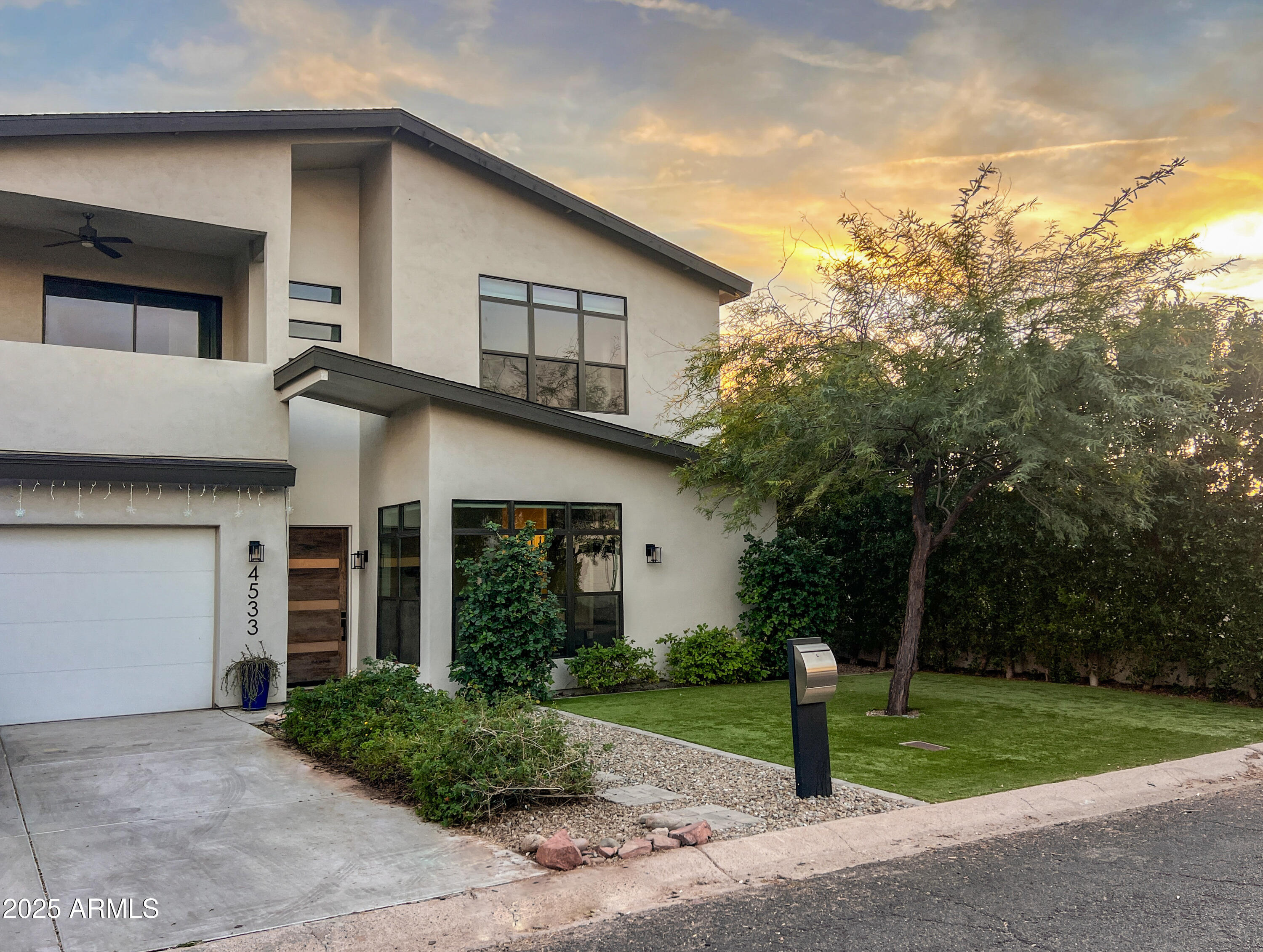 4533 East Montecito Avenue Phoenix, AZ 85018 - Photo 29 of 29 a view of a house with a yard and large tree