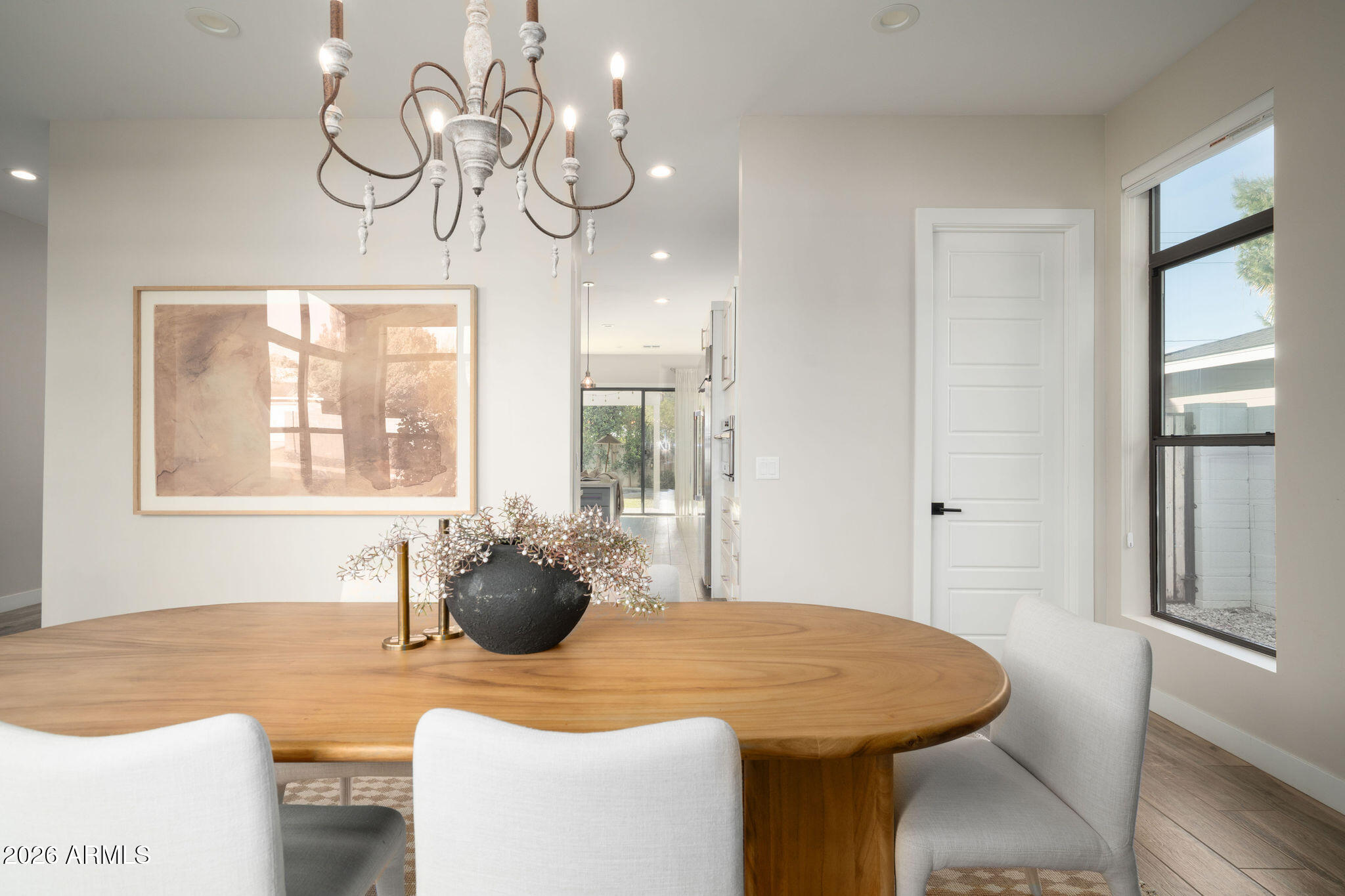 4533 East Montecito Avenue Phoenix, AZ 85018 - Photo 4 of 29 a dining room with wooden floor chandelier