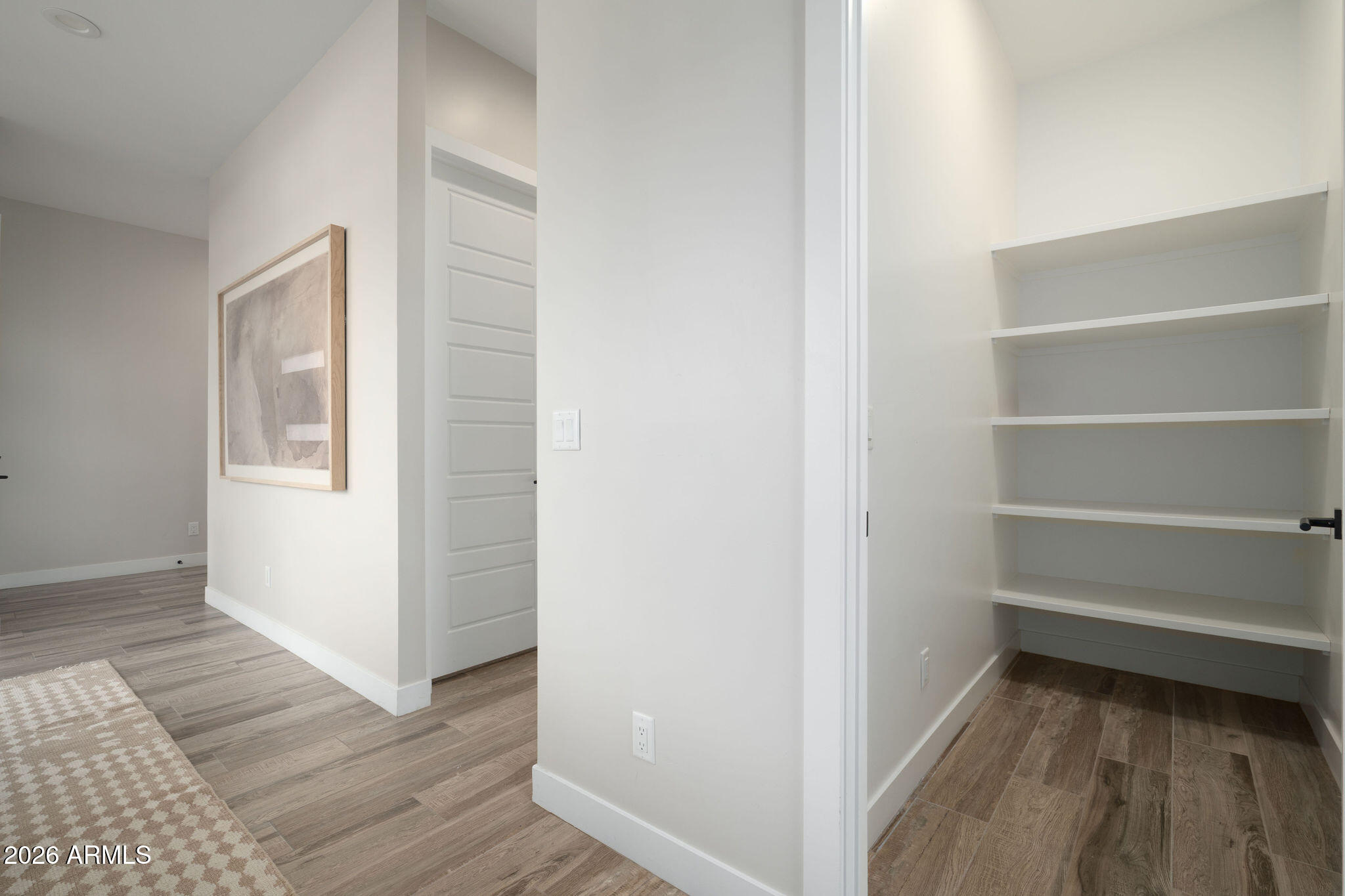 4533 East Montecito Avenue Phoenix, AZ 85018 - Photo 5 of 29 a view of a room with wooden floor and a window