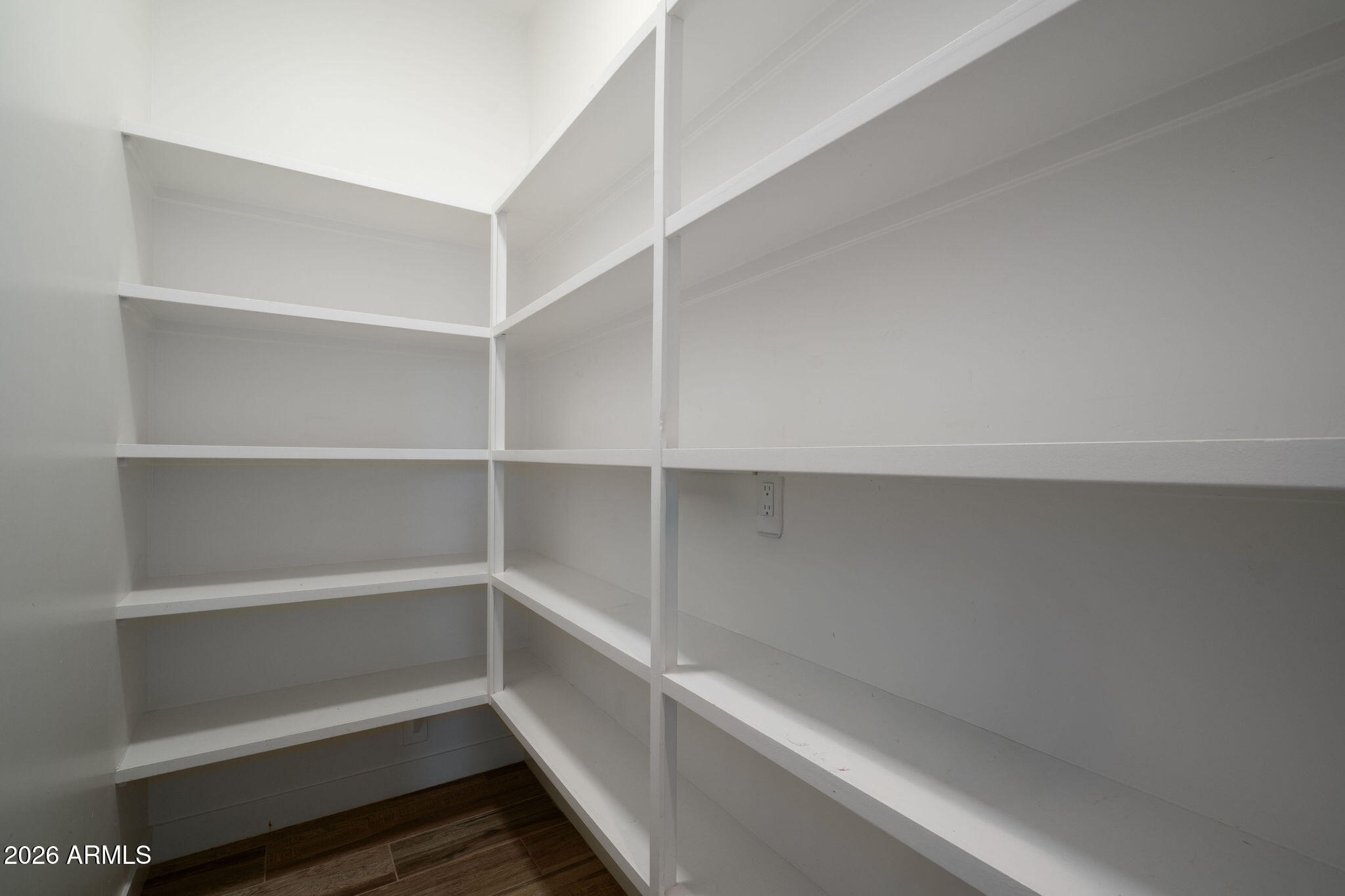4533 East Montecito Avenue Phoenix, AZ 85018 - Photo 6 of 29 a view of walk in closet with empty racks