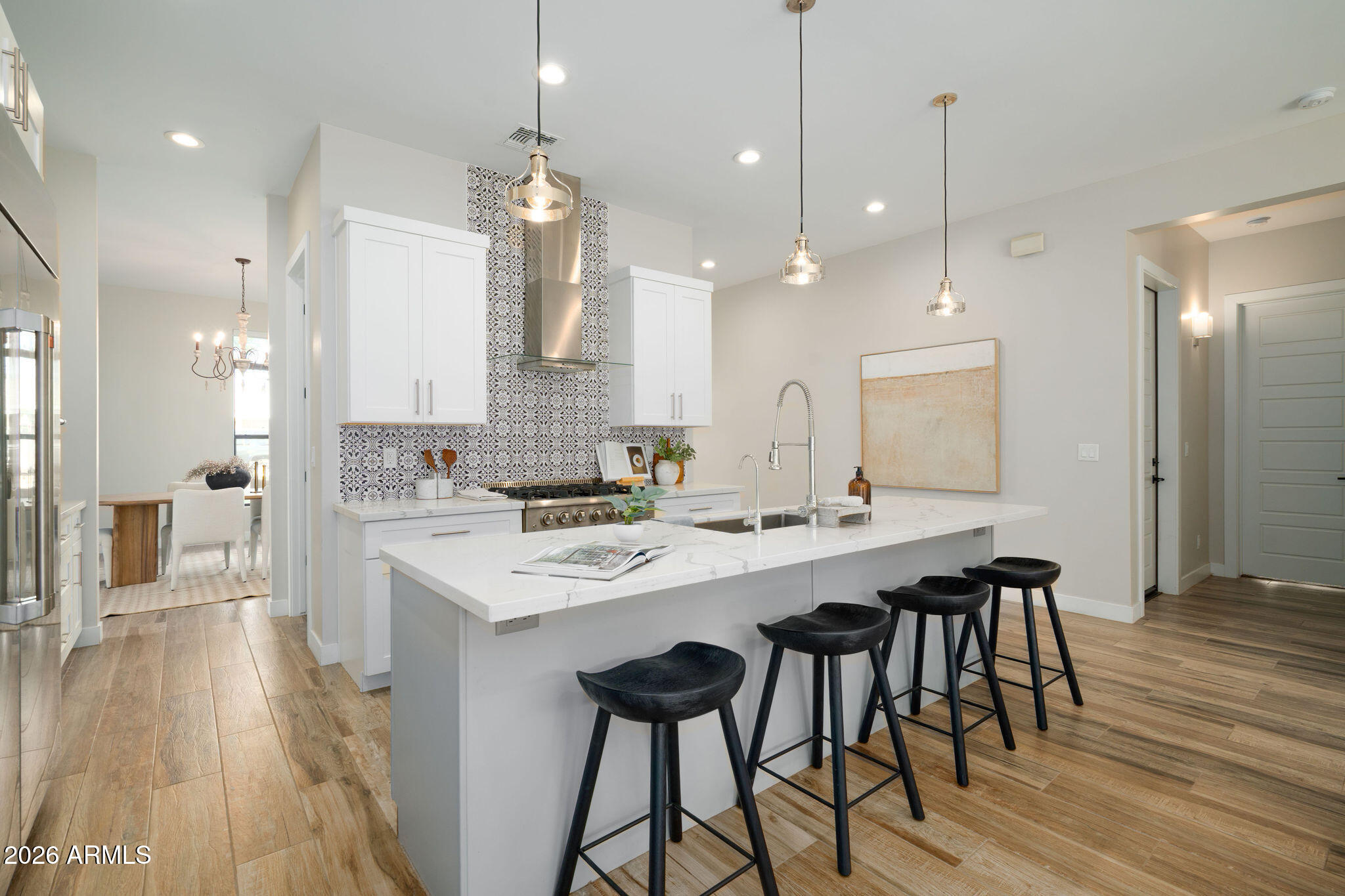 4533 East Montecito Avenue Phoenix, AZ 85018 - Photo 7 of 29 a large kitchen with a table and chairs
