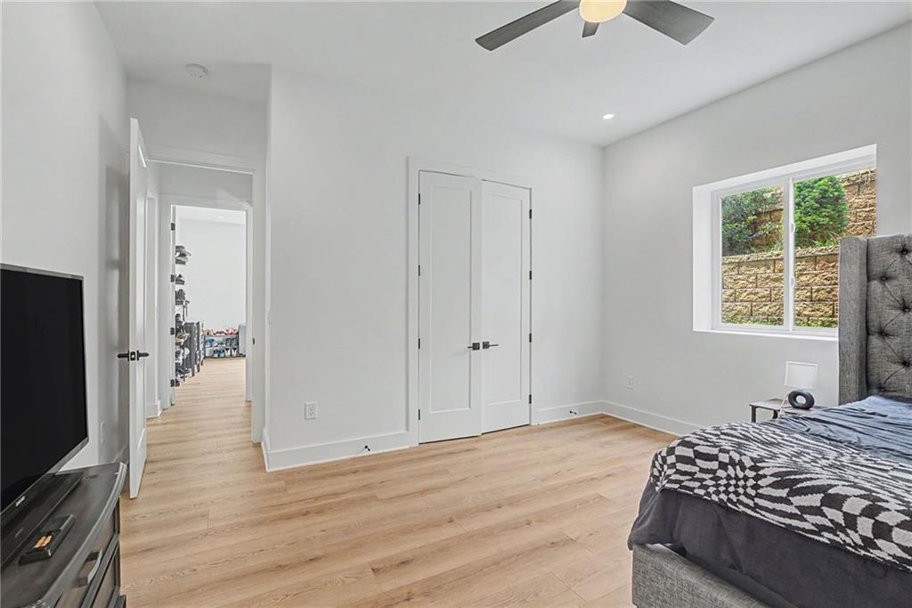 376 Hunnicut Road Southeast Mableton, GA 30126 - Photo 60 of 73 a bedroom with bed and window