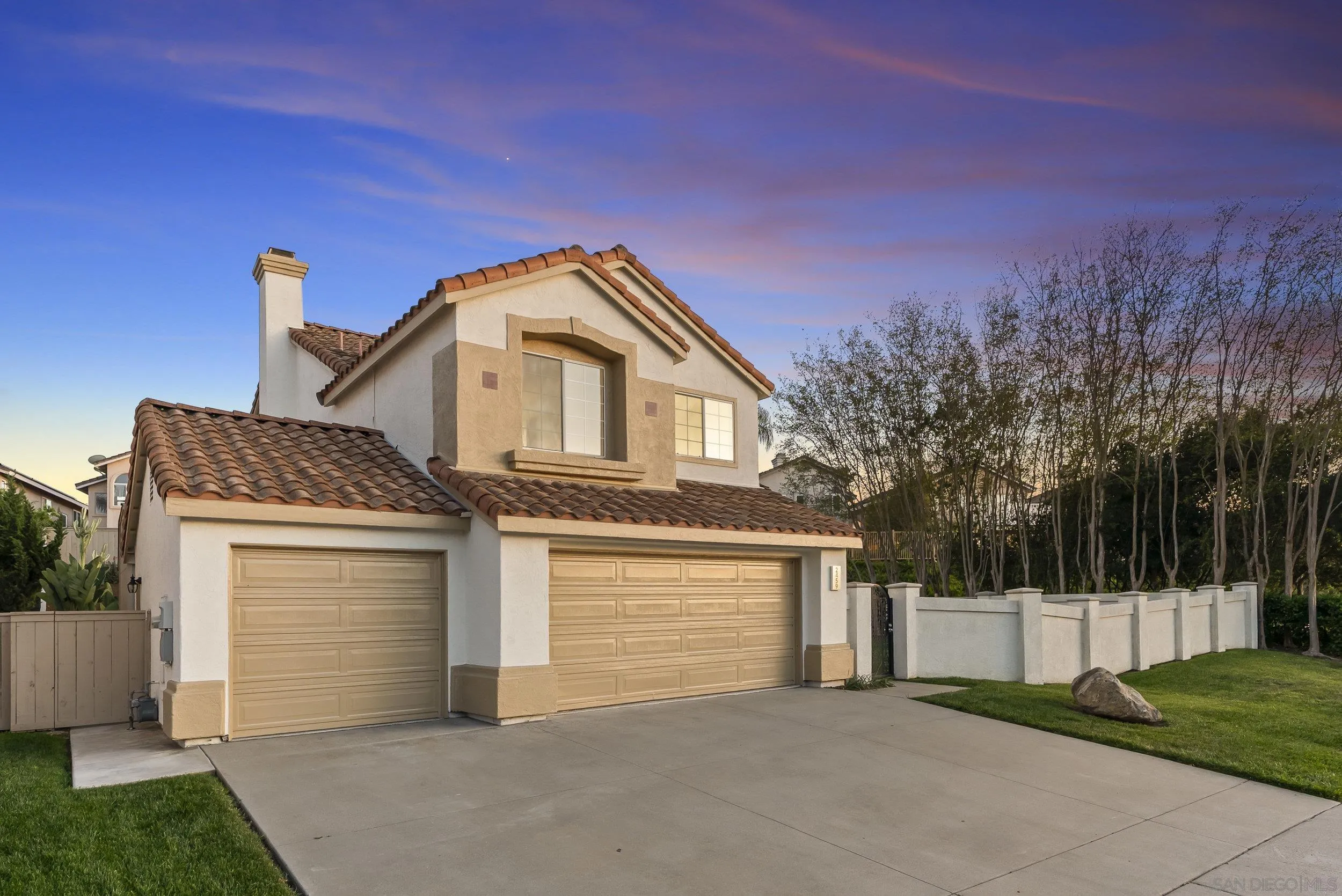 2459 North Summit Circle Glen Escondido, CA 92026 - Photo 2 of 2 a front view of a house with a garage
