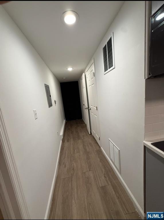 100 Rosa Parks Boulevard, Unit B1BY Paterson, NJ 07501 - Photo 4 of 10 a view of hallway with wooden floor