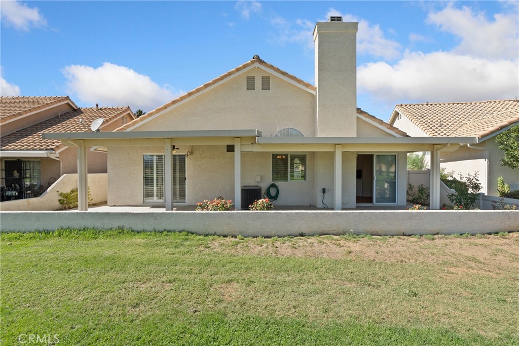 5772 Riviera Avenue Banning, CA 92220 - Photo 41 of 60 a front view of a house with garden
