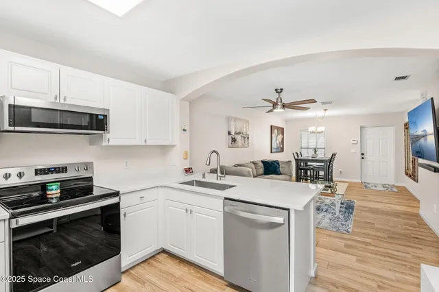 a bathroom with a sink a vanity and a mirror
