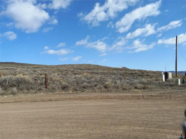a view of beach and mountain
