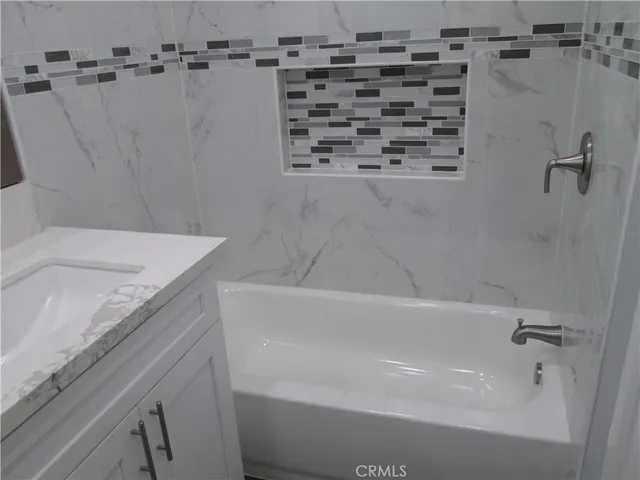 a bathroom with a bathtub