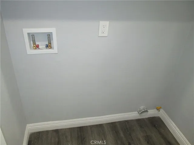 a view of small space with racks on the wall