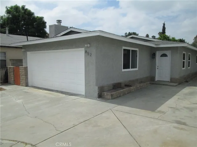 a view of a house with a roof