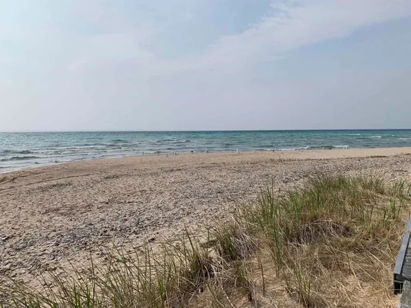 $2,799,000 | 410 South Golden Beach Drive, Kewadin, MI 49648