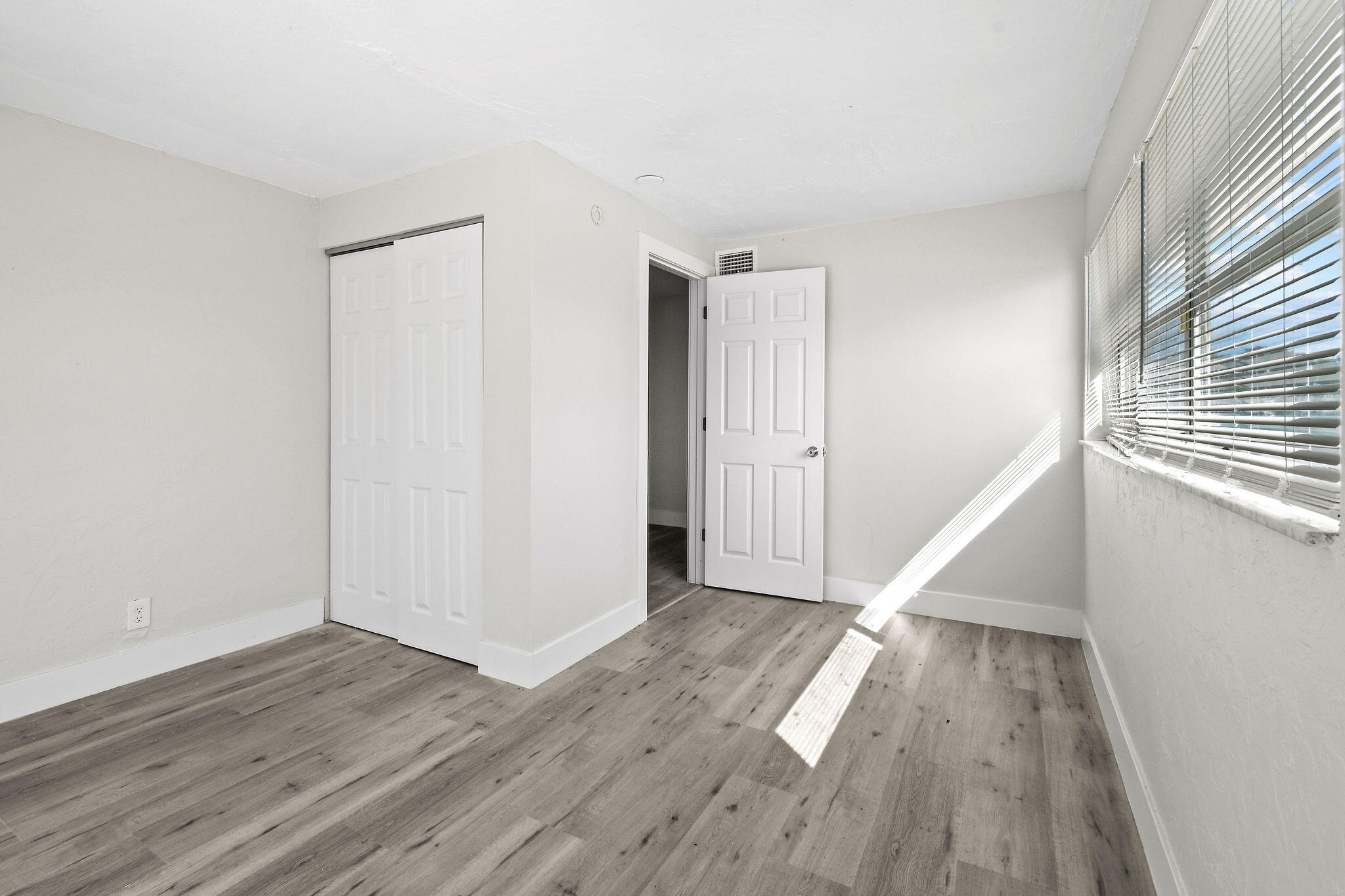 1301 West 25th Street Riviera Beach, FL 33404 - Photo 24 of 34 a view of entryway with wooden floor