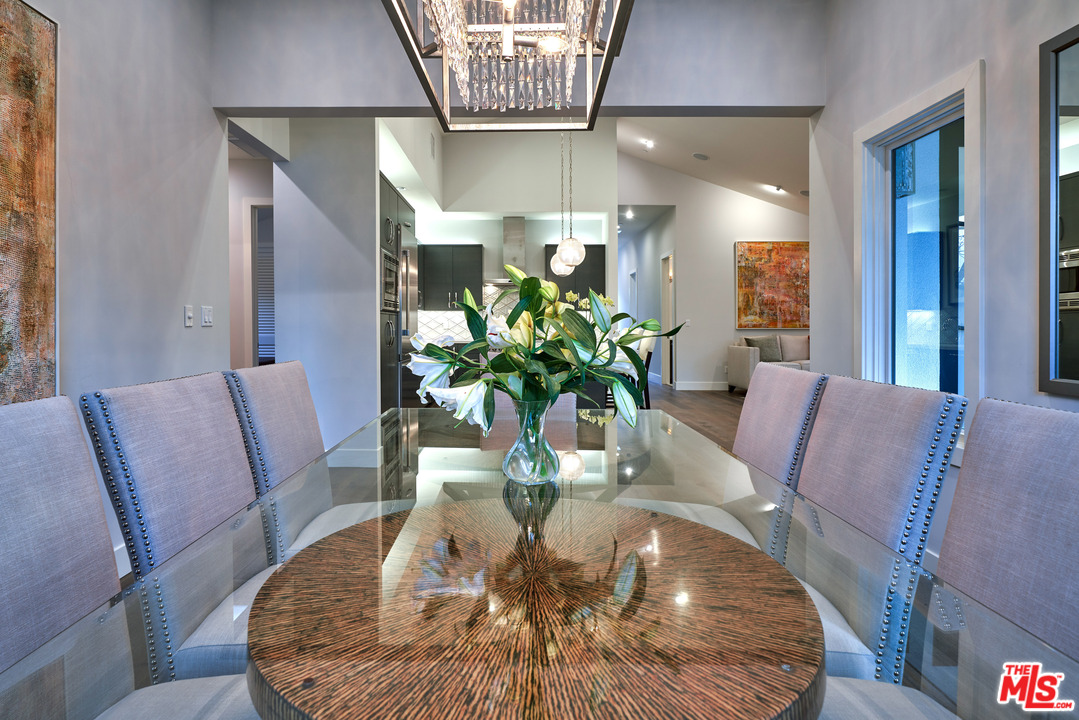 11622 Addison Street Valley Village, CA 91601 - Photo 16 of 39 a view of a dining room with furniture