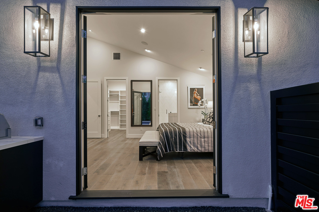 11622 Addison Street Valley Village, CA 91601 - Photo 27 of 39 a view of hall way with mirror and furniture