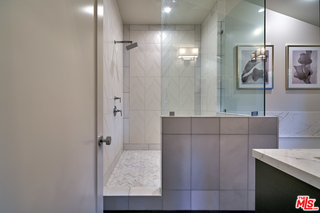 11622 Addison Street Valley Village, CA 91601 - Photo 29 of 39 a bathroom with a shower