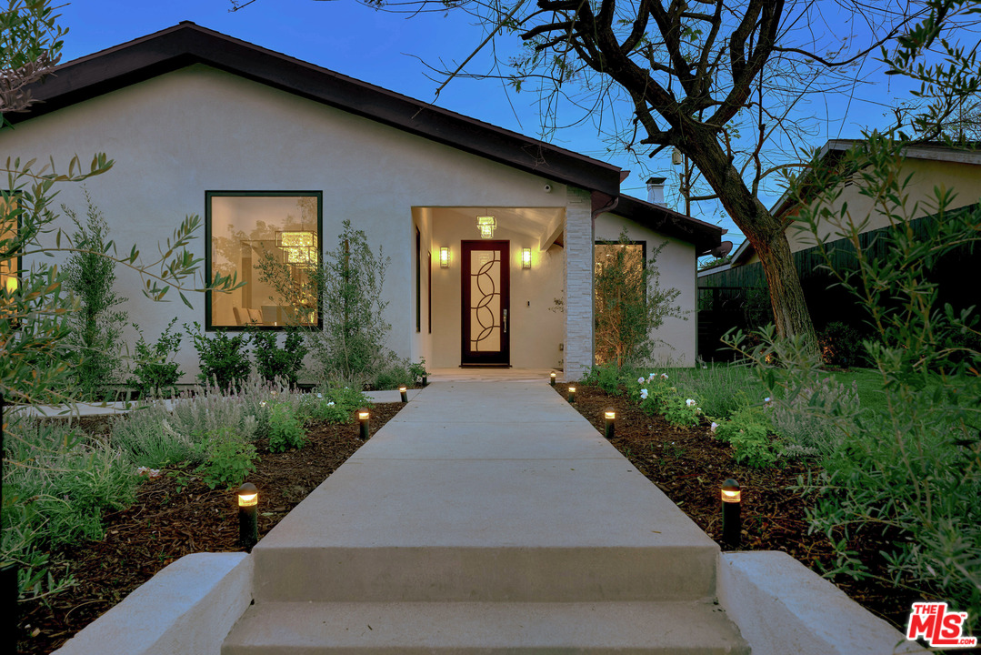 11622 Addison Street Valley Village, CA 91601 - Photo 4 of 39 a front view of a house with garden