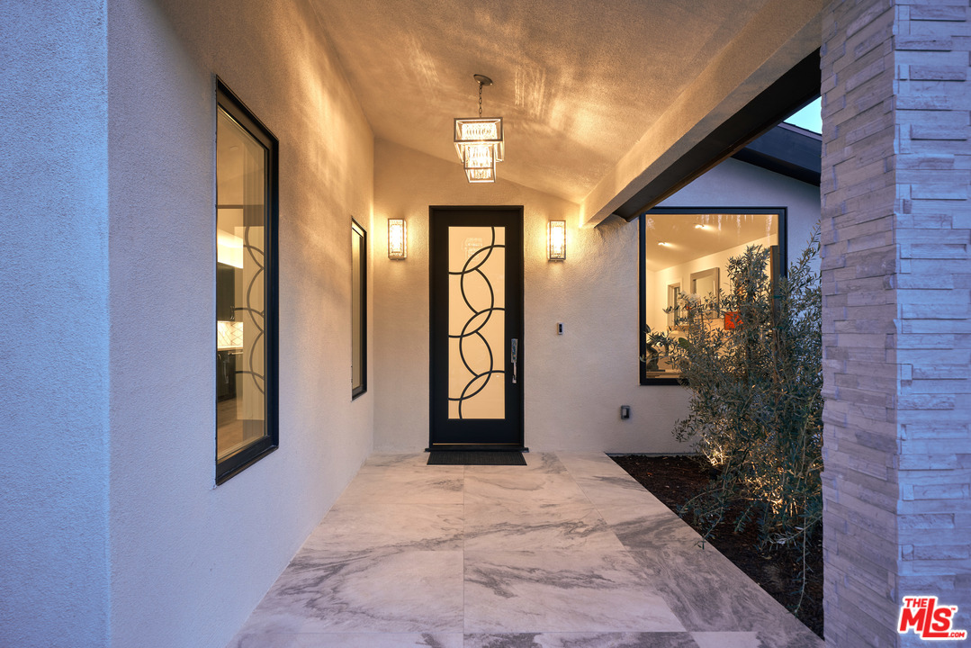 11622 Addison Street Valley Village, CA 91601 - Photo 6 of 39 a view of an entryway door and a yard