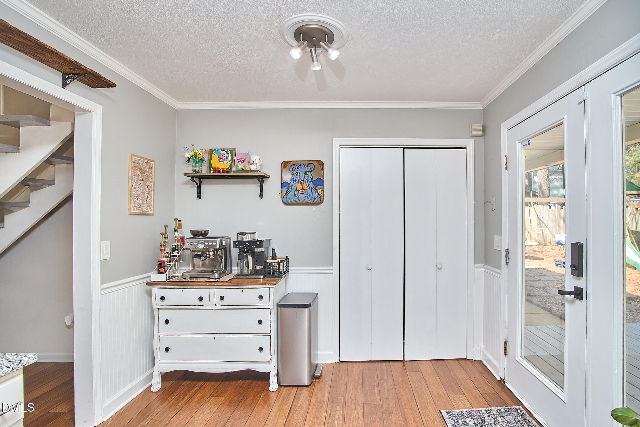 2102 Strebor Street Durham, NC 27705 - Photo 20 of 33 a view of a bedroom with wooden floor and cabinet