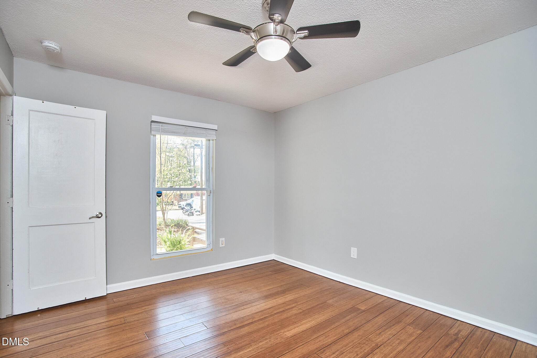 2102 Strebor Street Durham, NC 27705 - Photo 22 of 33 wooden floor in an empty room with a window