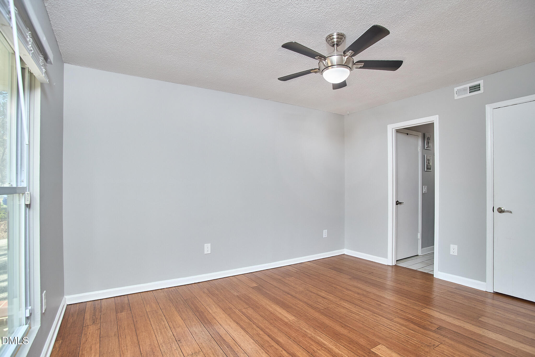2102 Strebor Street Durham, NC 27705 - Photo 23 of 33 a view of cabinets with wooden floor