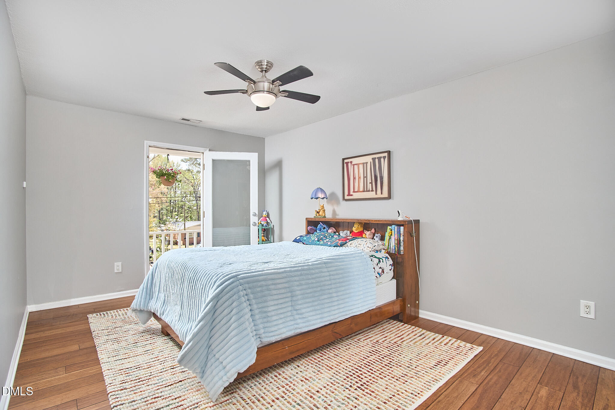 2102 Strebor Street Durham, NC 27705 - Photo 29 of 33 a bedroom with a large bed and a window
