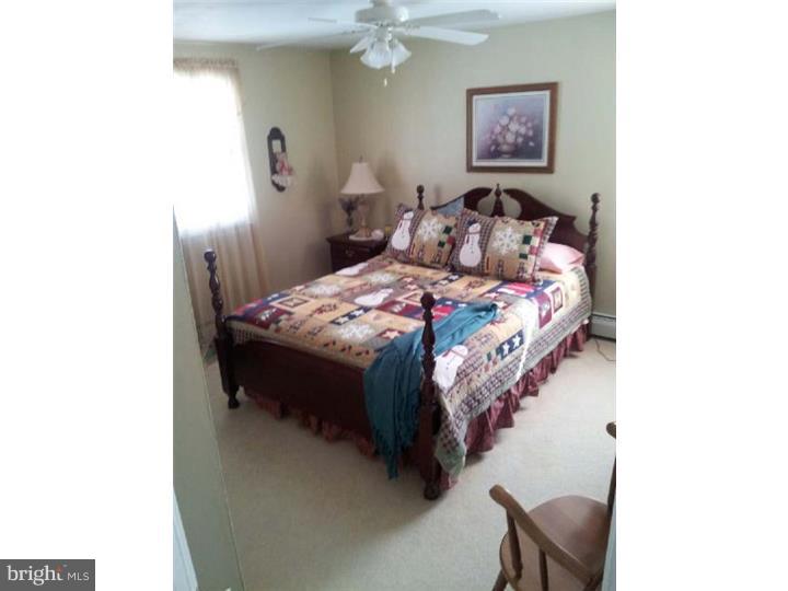 62 Brookline Road Warminster, PA 18974 - Photo 11 of 15 a bed room with a bed and a chair