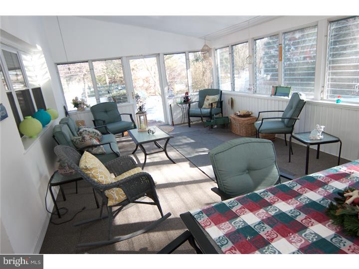 62 Brookline Road Warminster, PA 18974 - Photo 9 of 15 a living room with furniture and a large window