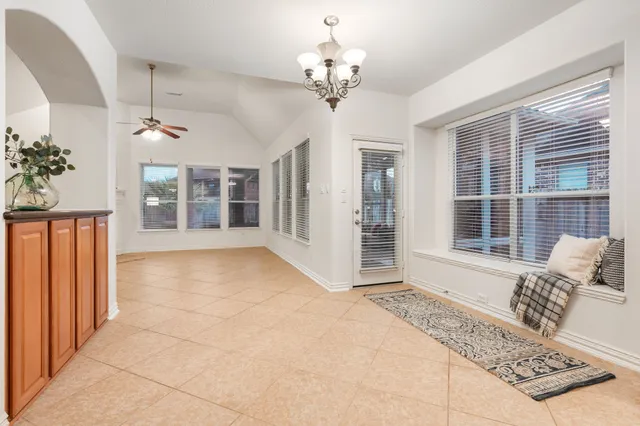 a view of an entryway with a chandelier