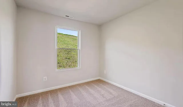 an empty room with a window