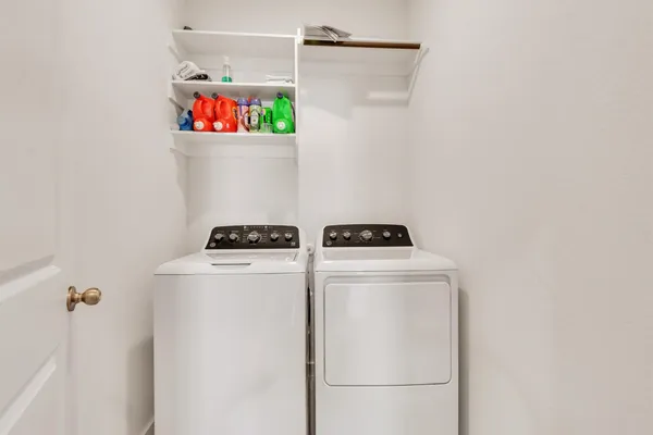 a view of a house with backyard and garden