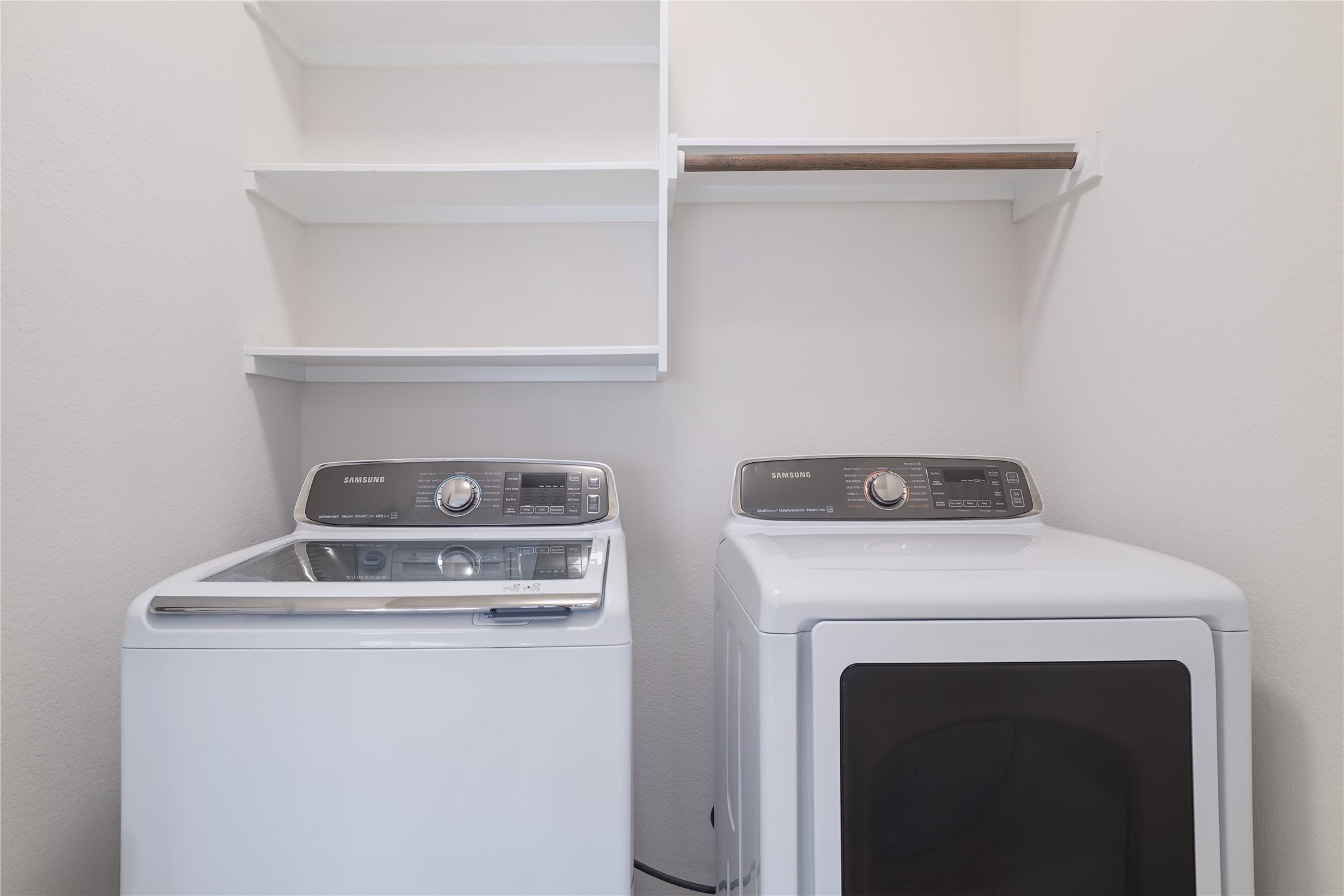 3341 Pauling Loop Round Rock, TX 78665 - Photo 26 of 40 Laundry room featuring washing machine and dryer