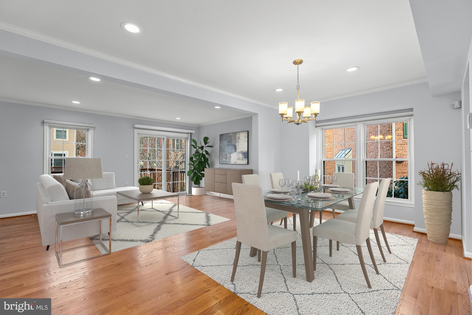 5465 Grove Ridge Way, Unit 123 Rockville, MD 20852 - Photo 15 of 39 a view of a dining room with furniture window and wooden floor